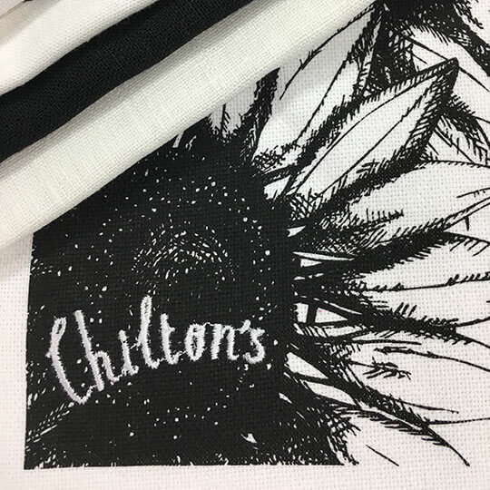 Chiltons tea towel for event.