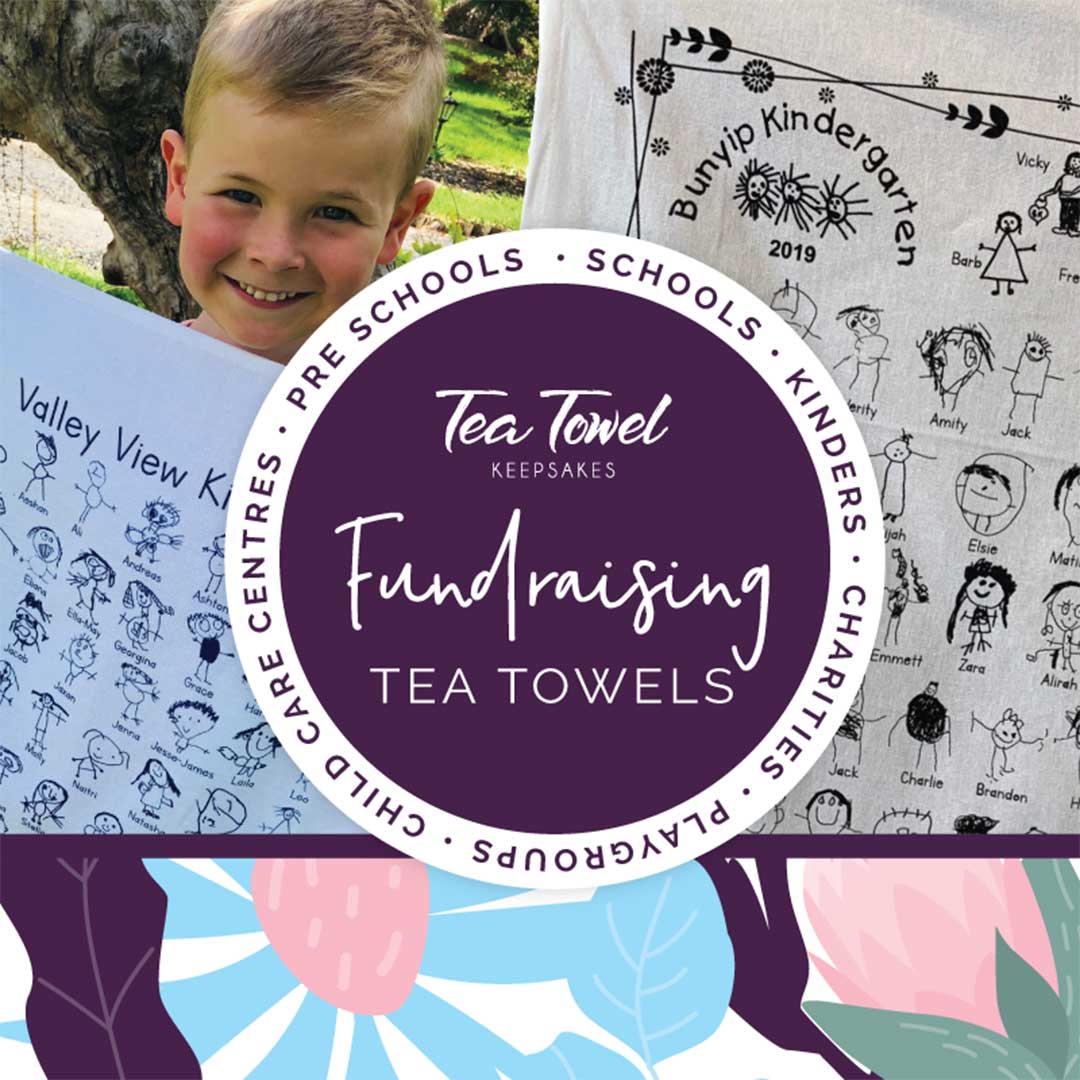 Boy smiling with fundraising tea towels